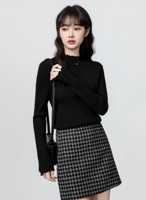 Knitted Sweater With Mock Neck And Ruffle Trim