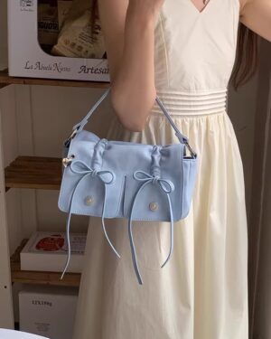 Sky Blue Mini Drawstring Bow Sling Bag | Wonhee - ILLIT